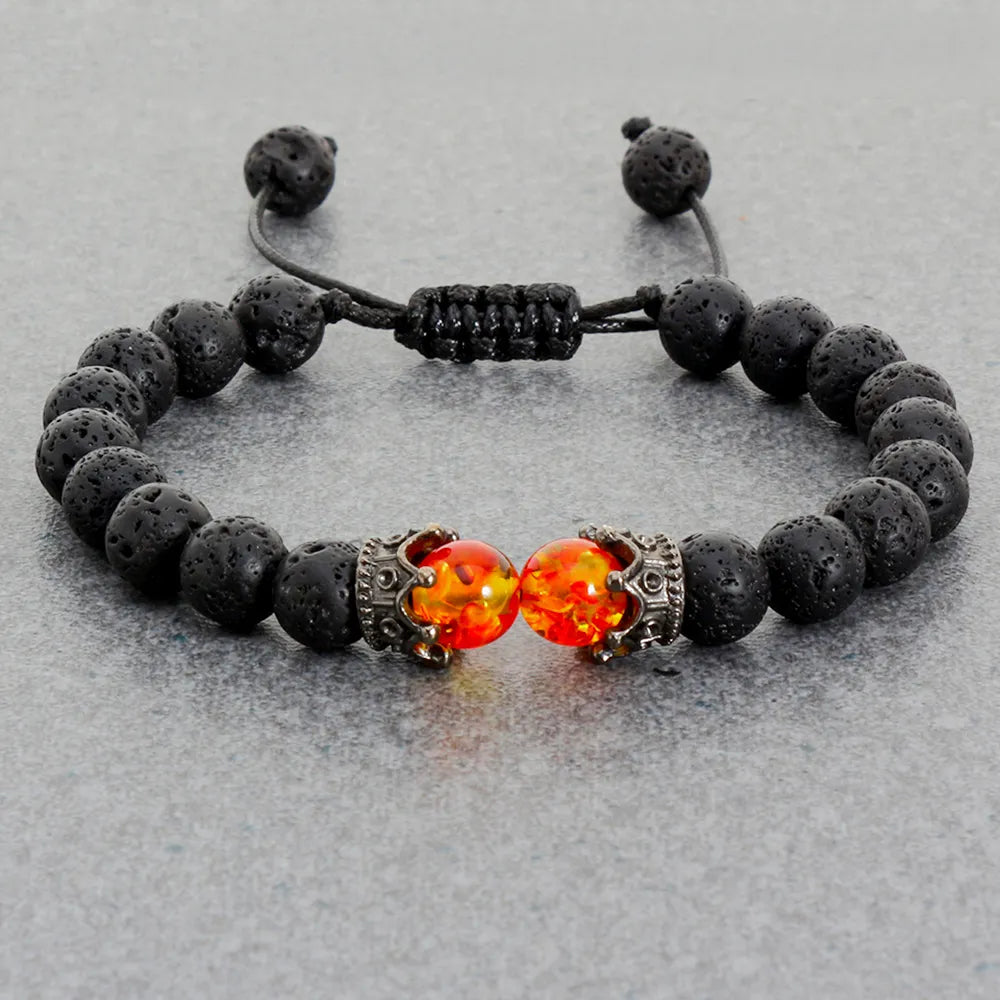 Pulsera de cuentas de ojo de tigre con dije de corona de piedra de Lava negra