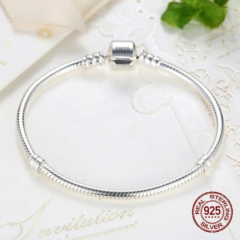 Pulsera de plata de ley 925 con dijes de hueso de serpiente suave