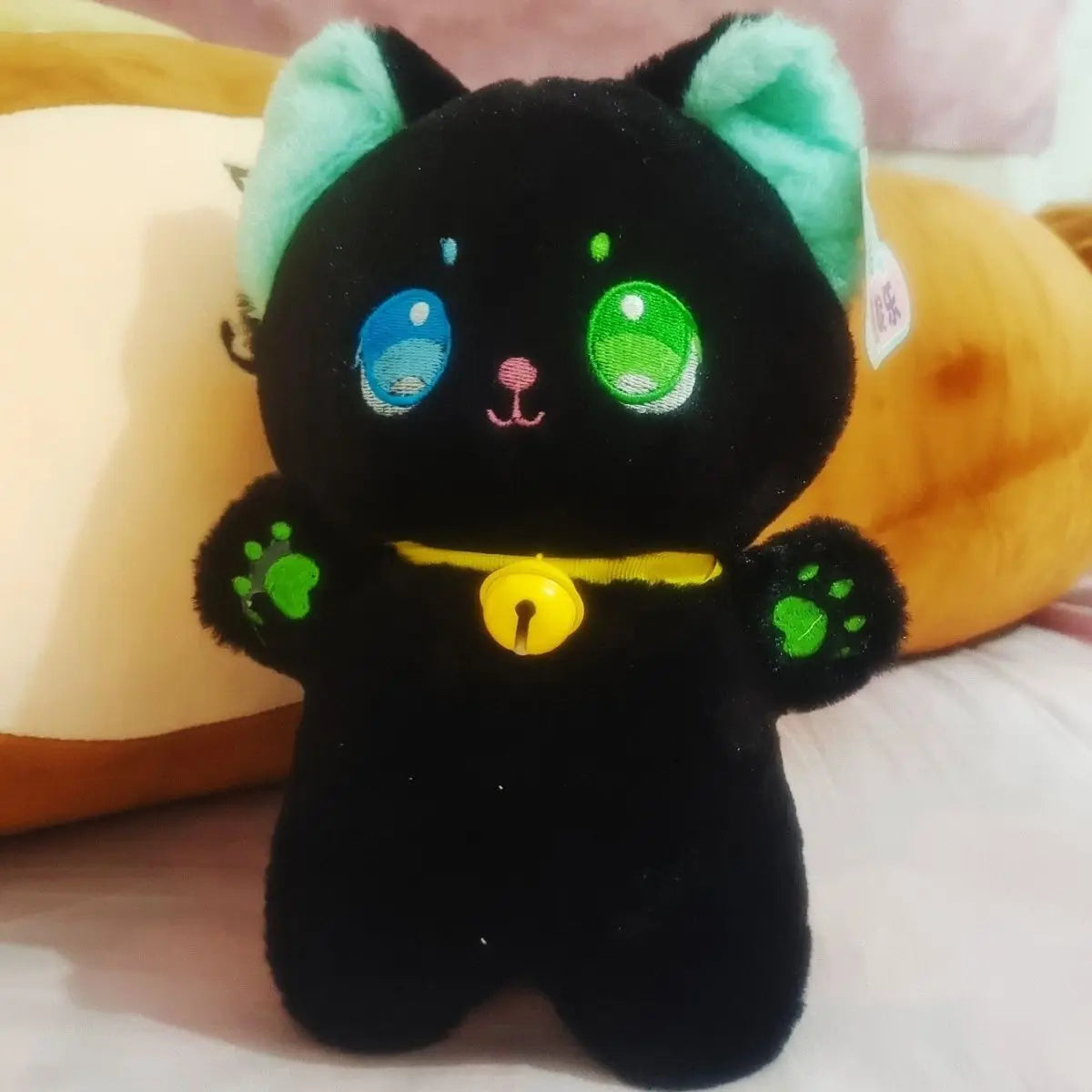 Juguete de peluche de gato blanco y negro de 25 cm