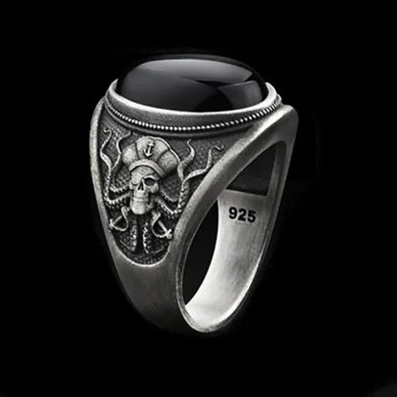 Anillo gótico de calavera pirata y pulpo circonita negra