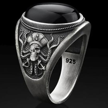 Anillo gótico de calavera pirata y pulpo circonita negra