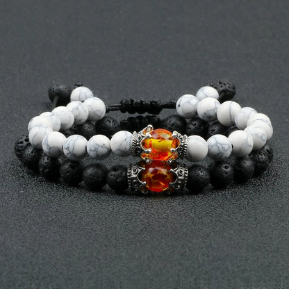 Pulsera de cuentas de ojo de tigre con dije de corona de piedra de Lava negra