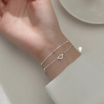 Pulsera de plata de ley 925 con doble corazón de amor y cuentas redondas